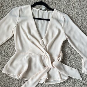 Like new Forever 21 contemporary cream long sleeve wrap blouse Womens size XS
